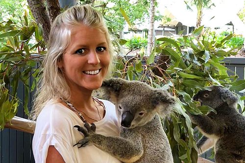 Cuddling a koala at Wildlife Habitat Port Douglas