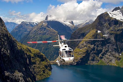 Indulgent Escape: New Zealand Luxury Vacation - Helicopter Over Milford Sound