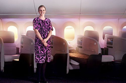 Air New Zealand Flight Attendant Welcoming Guests to the Business Premier Cabin