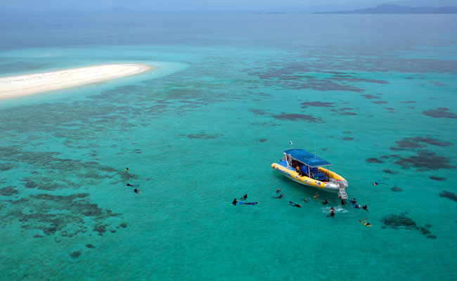 Snorkeling in the Great Barrier Reef - Tourism Queensland - Ningaloo Reef Australia