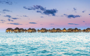 Overwater Bungalows at Sunset - Le Taha'a Resort