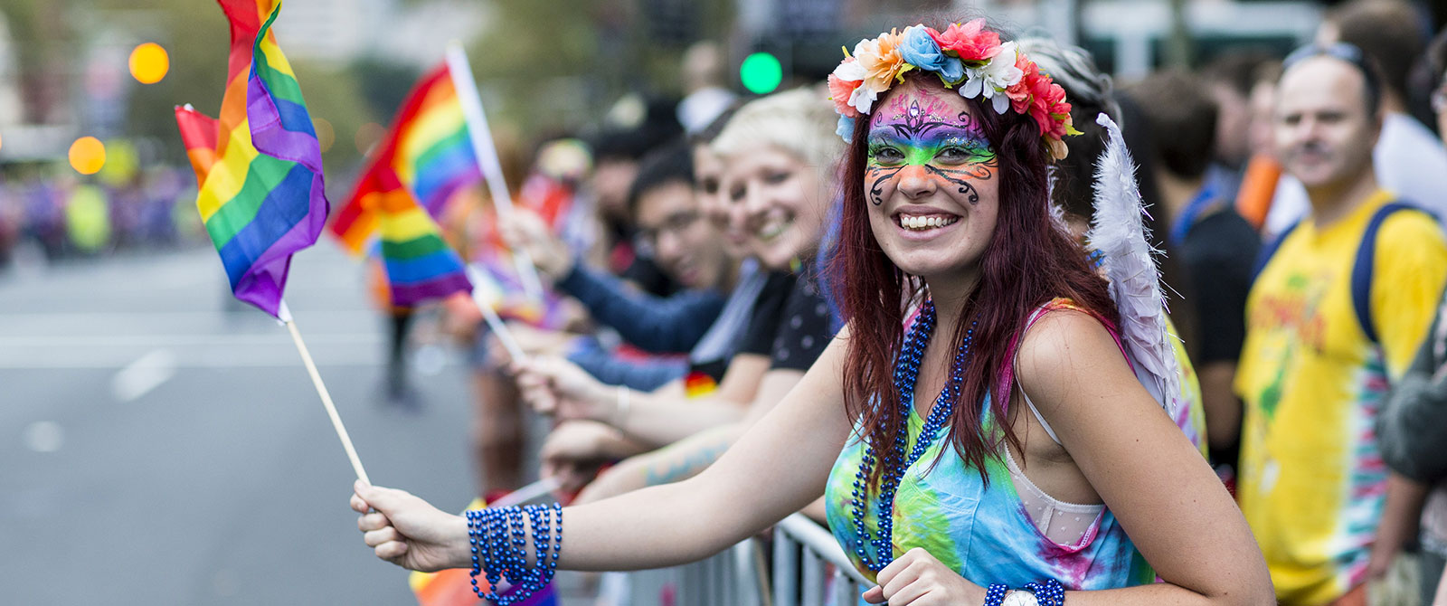 Woman Holding a Rainbow LGBT+ Pride Flag at the Sydney Gay and Lesbian Mardi Gras Parade