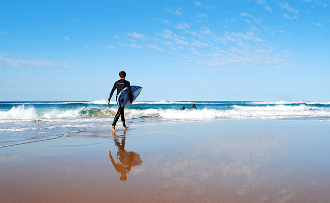 Surfing Vacations in Australia - Surfer on Parsons Beach