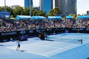 Courtside view of an outdoor tennis match at the 2018 Australian Open
